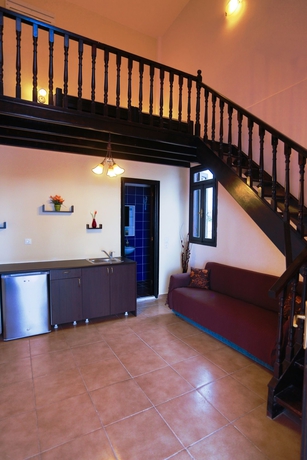 Imagen de la habitación del Hotel Little Lindos Sea View Studios. Foto 9