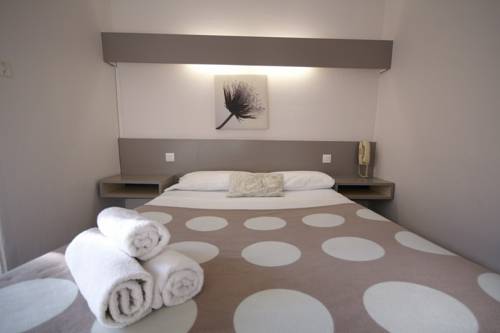 Imagen de la habitación del Hotel Little Lodge. Foto 4
