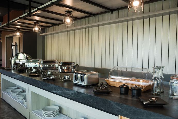 Imagen del bar/restaurante del Hotel Little Loft Hotel. Foto 7