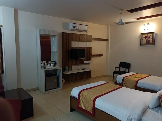 Imagen de la habitación del Hotel Little Palace, Dibrugarh. Foto 13