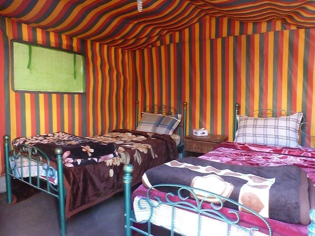 Imagen de la habitación del Hotel Little Petra Bedouin Camp. Foto 17