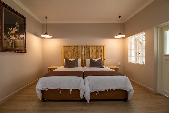 Imagen de la habitación del Hotel Little Pilgrims Boutique Hotel. Foto 2