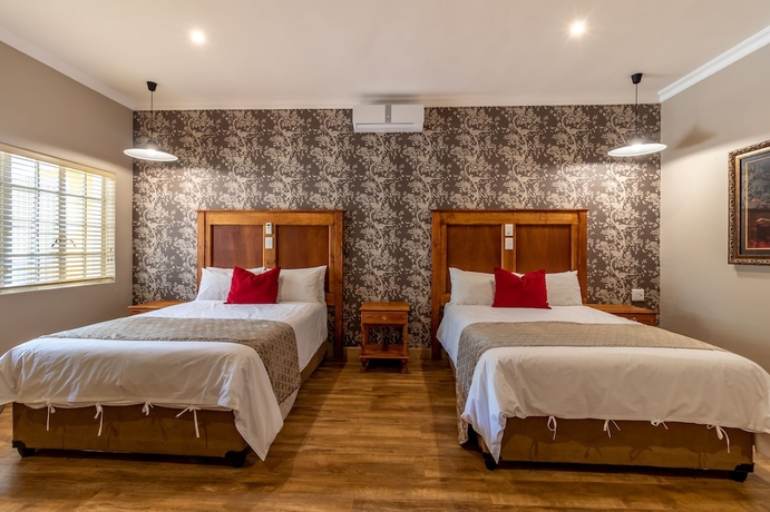 Imagen de la habitación del Hotel Little Pilgrims Boutique Hotel. Foto 7