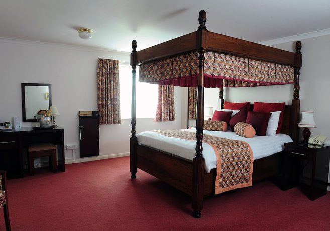Imagen de la habitación del Hotel Little Silver Country. Foto 7