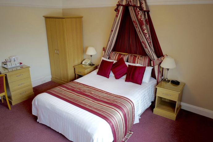 Imagen de la habitación del Hotel Little Silver Country. Foto 9
