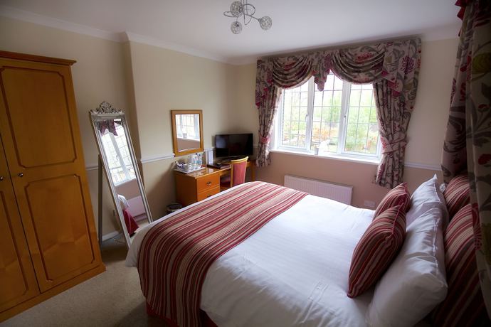 Imagen de la habitación del Hotel Little Silver Country. Foto 16