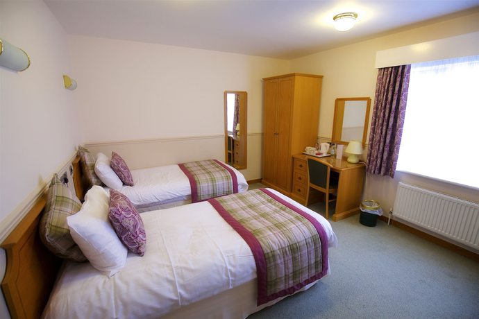 Imagen de la habitación del Hotel Little Silver Country. Foto 17