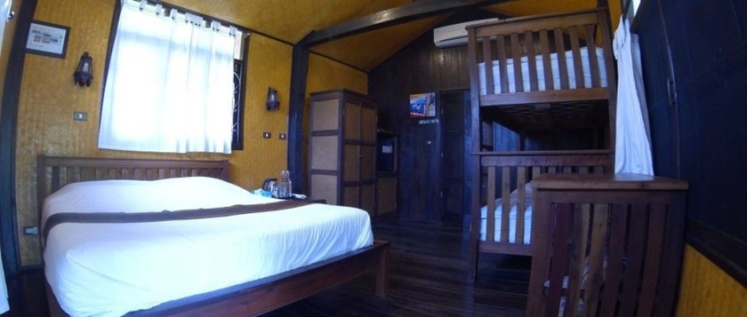 Imagen de la habitación del Hotel Little Village Chiang Mai. Foto 4