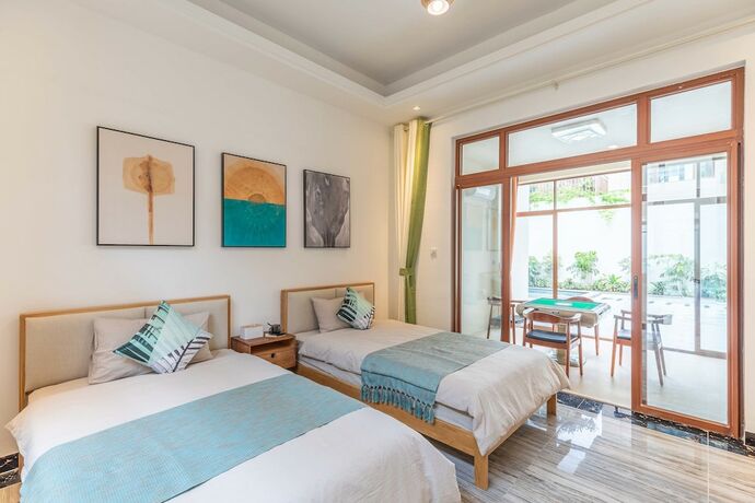 Imagen de la habitación del Hotel Litu Holiday Villa. Foto 18