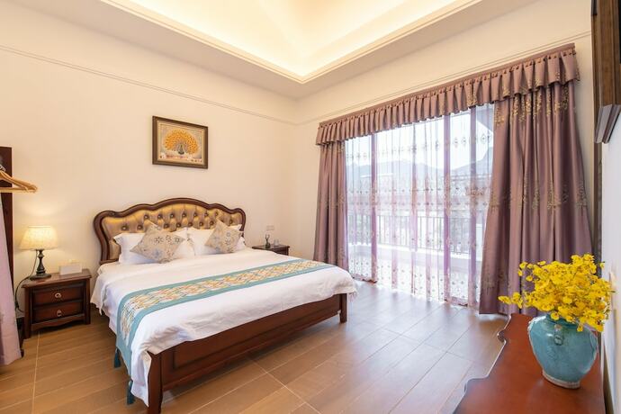 Imagen de la habitación del Hotel Litu Holiday Villa. Foto 19