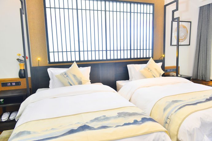 Imagen de la habitación del Hotel Liuheyunyan .dali. Foto 3