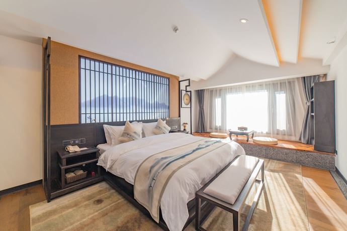 Imagen de la habitación del Hotel Liuheyunyan .dali. Foto 7