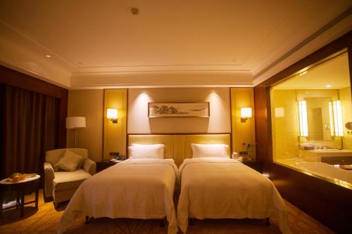 Imagen de la habitación del Hotel Liuyuan Jin Jiang. Foto 6