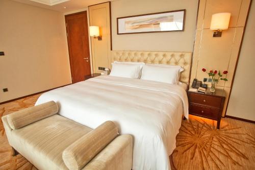 Imagen de la habitación del Hotel Liuyuan Jin Jiang. Foto 7