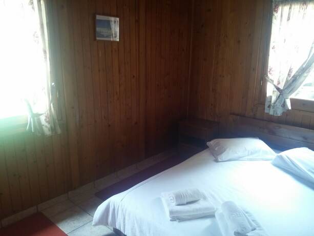 Imagen de la habitación del Hotel Livadaki Village. Foto 17