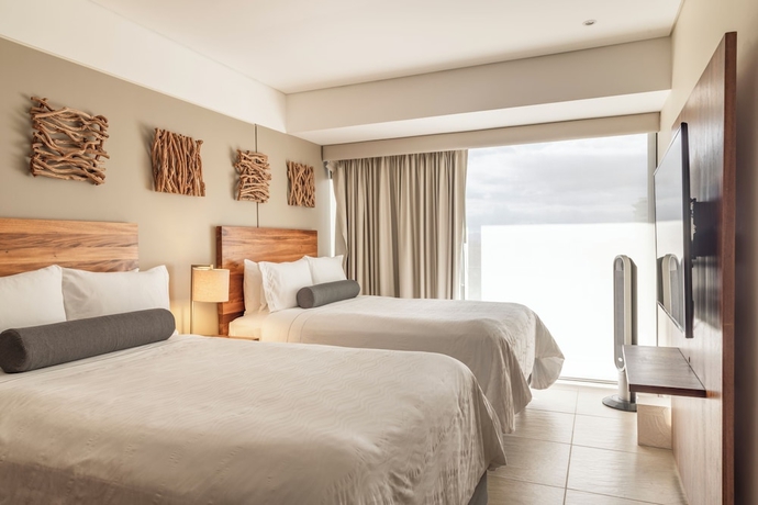 Imagen de la habitación del Hotel Live Aqua Private Residences Vallarta. Foto 3