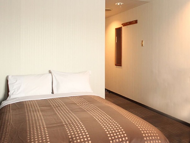 Imagen de la habitación del Hotel Live Max Budget - Tokyo Hamura Station. Foto 17