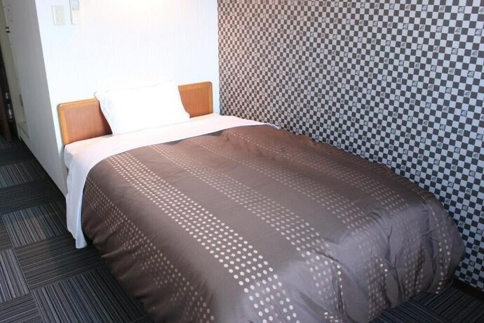Imagen de la habitación del Hotel Live Max Budget - Tokyo Hamura Station. Foto 22