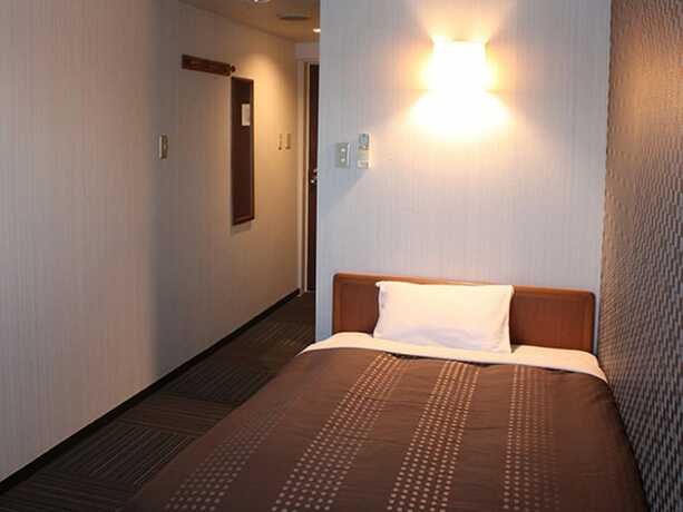 Imagen de la habitación del Hotel Live Max Budget - Tokyo Hamura Station. Foto 23