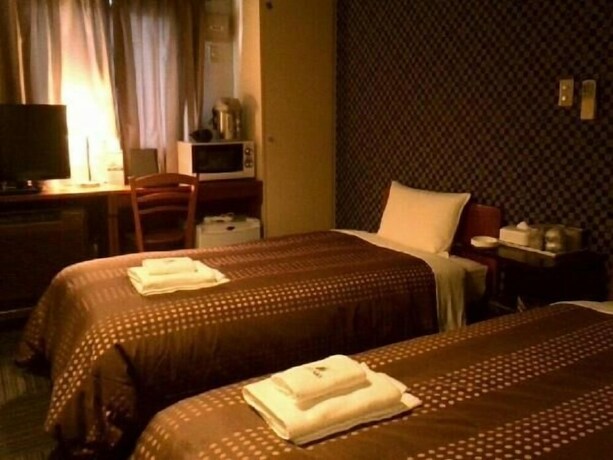 Imagen de la habitación del Hotel Live Max Budget - Tokyo Hamura Station. Foto 29