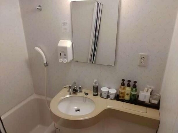 Imagen de la habitación del Hotel Live Max Budget - Tokyo Hamura Station. Foto 32