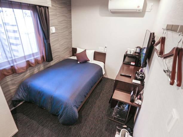 Imagen de la habitación del Hotel Live Max Tokyo Kanda Station. Foto 9