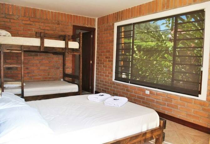 Imagen de la habitación del Hotel Live The Life And Toro Bar. Foto 11