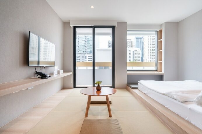 Imagen de la habitación del Hotel LiveZen Bangkok. Foto 18