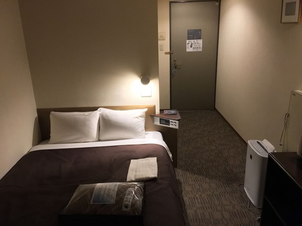 Imagen de la habitación del Hotel Livemax Amagasaki. Foto 7