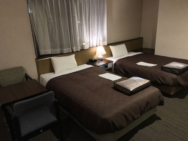 Imagen de la habitación del Hotel Livemax Amagasaki. Foto 10