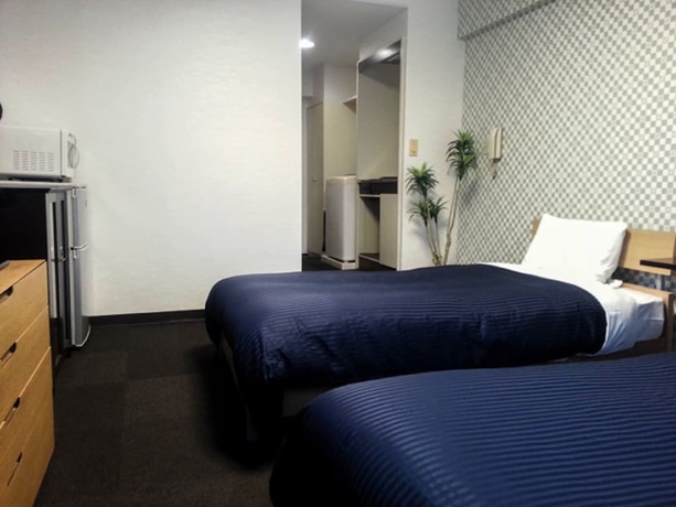 Imagen de la habitación del Hotel Livemax Budget Fuchu. Foto 4