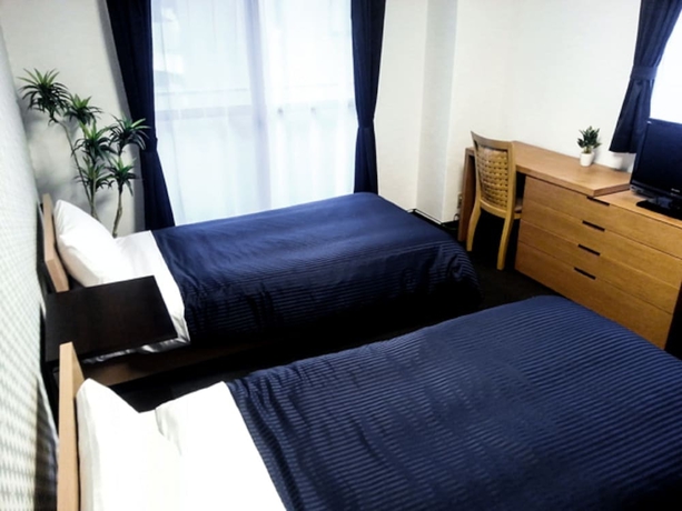 Imagen de la habitación del Hotel Livemax Budget Fuchu. Foto 5