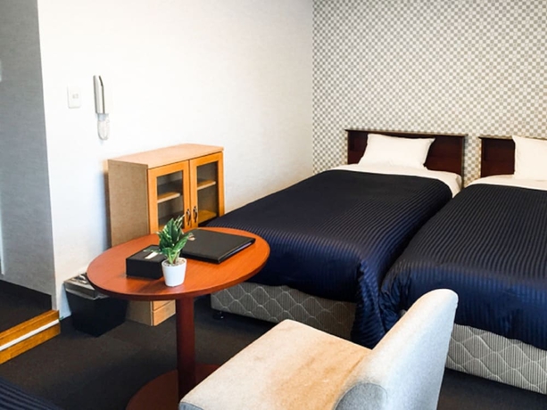 Imagen de la habitación del Hotel Livemax Budget Fuchu. Foto 6