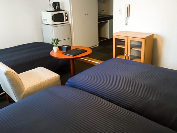 Imagen de la habitación del Hotel Livemax Budget Fuchu. Foto 7
