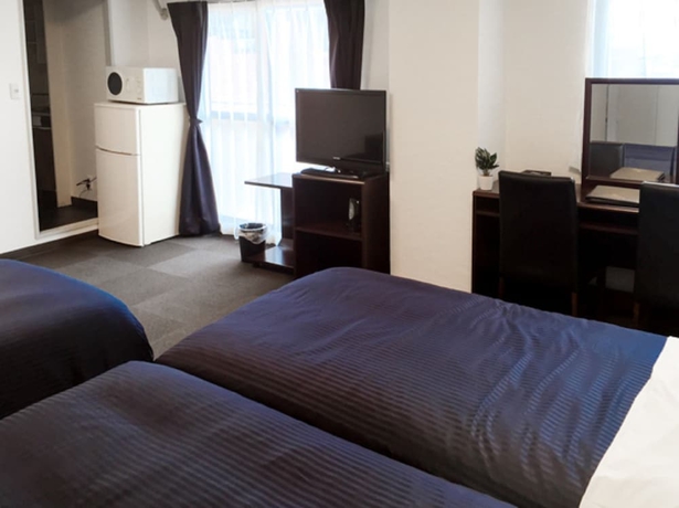 Imagen de la habitación del Hotel Livemax Budget Fuchu. Foto 8