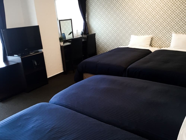 Imagen de la habitación del Hotel Livemax Budget Fuchu. Foto 9