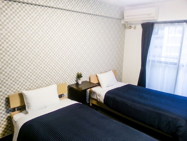 Imagen de la habitación del Hotel Livemax Budget Fuchu. Foto 10