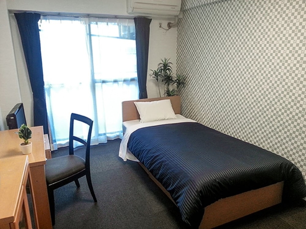 Imagen de la habitación del Hotel Livemax Budget Fuchu. Foto 12