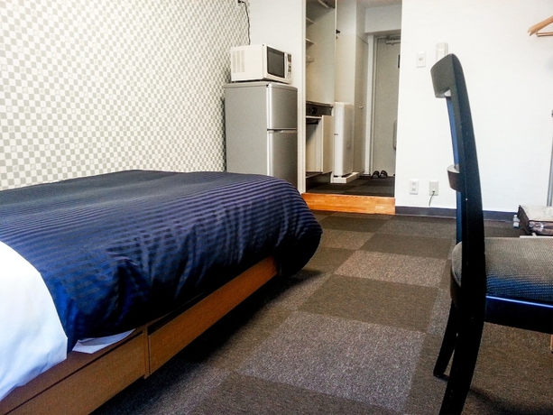 Imagen de la habitación del Hotel Livemax Budget Fuchu. Foto 13