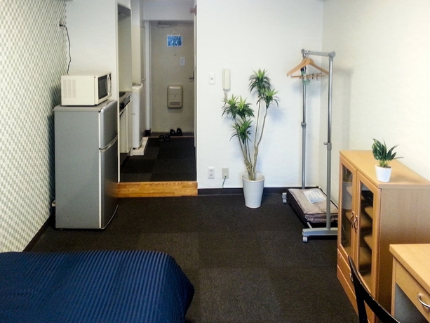 Imagen de la habitación del Hotel Livemax Budget Fuchu. Foto 14