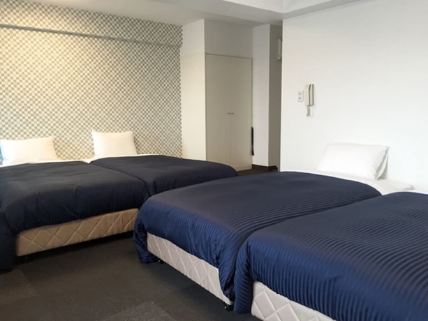 Imagen de la habitación del Hotel Livemax Budget Fuchu. Foto 15