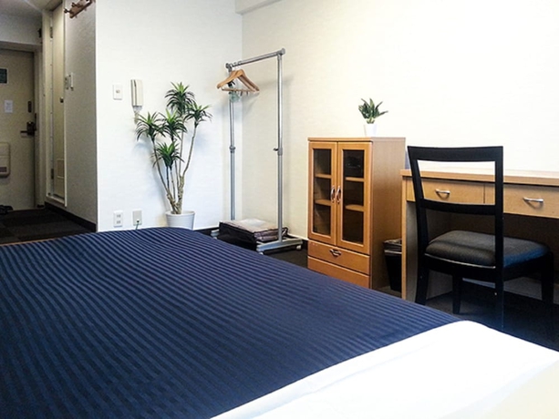 Imagen de la habitación del Hotel Livemax Budget Fuchu. Foto 16