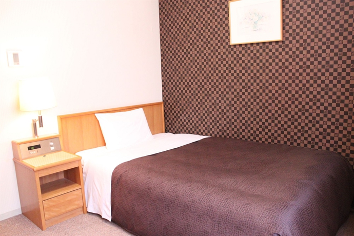 Imagen de la habitación del Hotel Livemax Budget Shimbashi. Foto 7