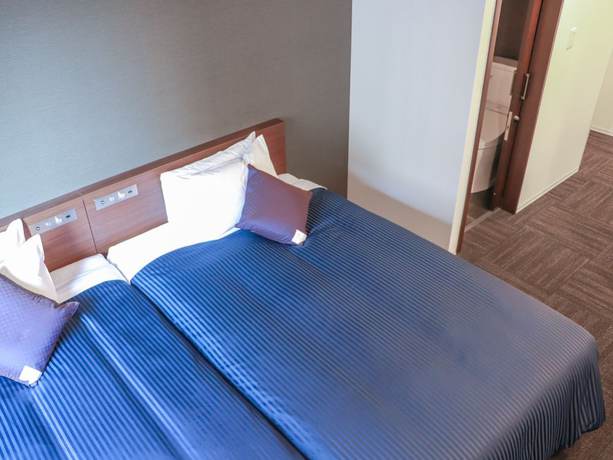 Imagen de la habitación del Hotel Livemax Chibaminato Ekimae. Foto 9