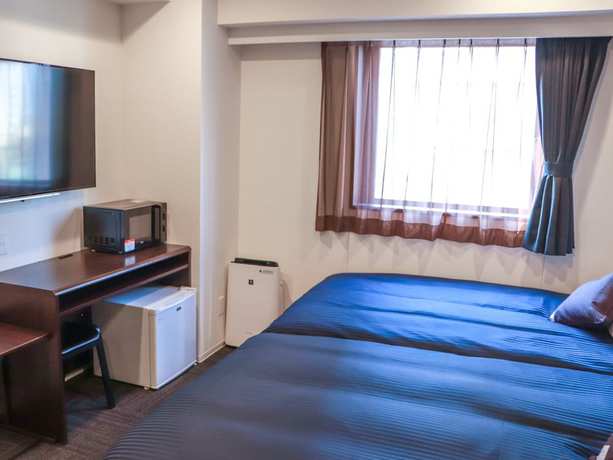 Imagen de la habitación del Hotel Livemax Chibaminato Ekimae. Foto 10
