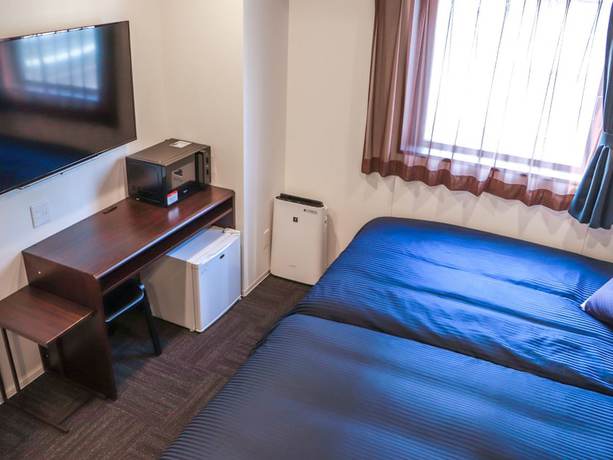 Imagen de la habitación del Hotel Livemax Chibaminato Ekimae. Foto 13