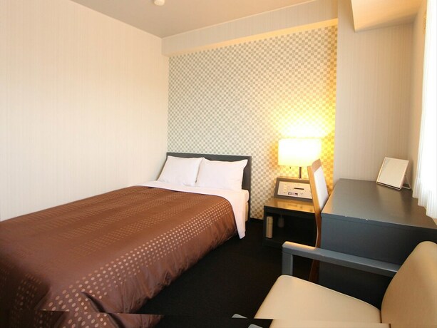 Imagen de la habitación del Hotel Livemax Chitose. Foto 21