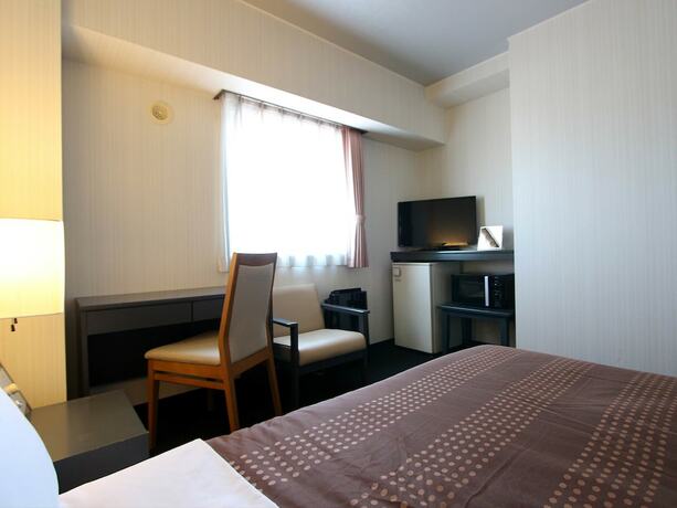 Imagen de la habitación del Hotel Livemax Chitose. Foto 26