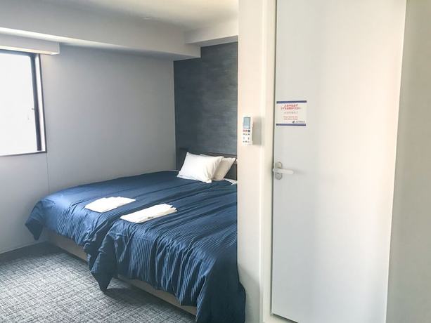 Imagen de la habitación del Hotel Livemax Fukushima Koriyama Ekimae. Foto 12