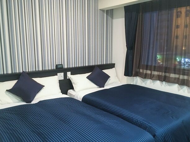 Imagen de la habitación del Hotel Livemax Gifu-ekimae. Foto 17